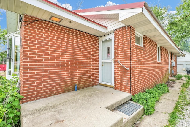 319 N Third St, Fisher, IL 61843 - doorway to property featuring brick siding