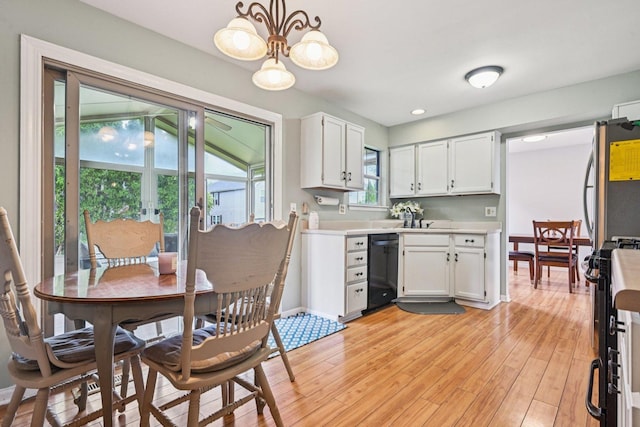 1643 Warrington Ln, Crystal Lake, IL 60014 - kitchen with black appliances, light countertops, white cabinetry, light wood-type flooring, and recessed lighting