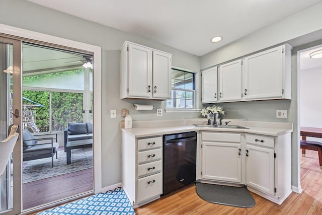 1643 Warrington Ln, Crystal Lake, IL 60014 - kitchen featuring dishwasher, white cabinetry, light countertops, light wood-style floors, and recessed lighting