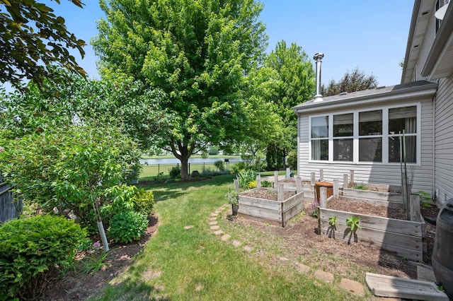 1639 Brower Pl, Sycamore, IL 60178 - view of yard featuring a vegetable garden and a water view
