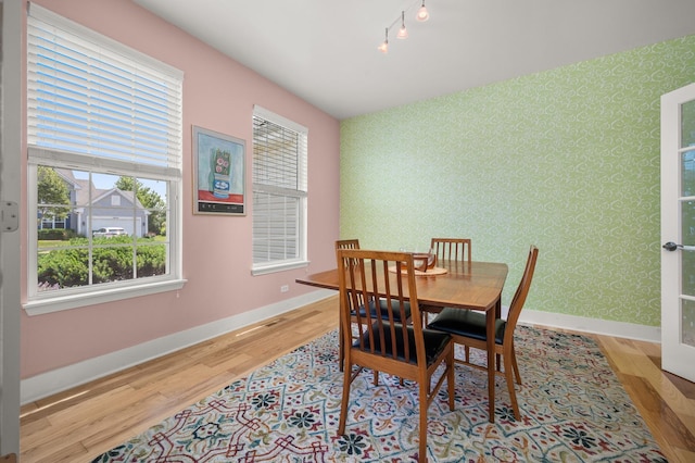 1639 Brower Pl, Sycamore, IL 60178 - dining area with wood finished floors, track lighting, and wallpapered walls