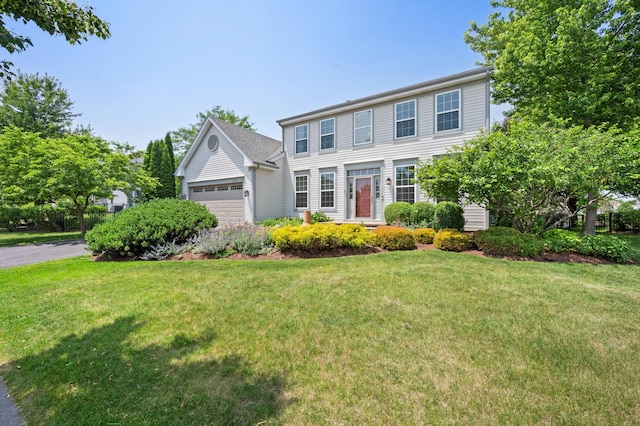 1639 Brower Pl, Sycamore, IL 60178 - colonial house featuring an attached garage and a front lawn