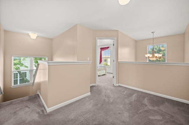 1639 Brower Pl, Sycamore, IL 60178 - hall featuring an upstairs landing, a chandelier, plenty of natural light, and carpet