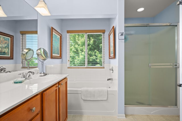 1639 Brower Pl, Sycamore, IL 60178 - full bathroom featuring vanity, a stall shower, a garden tub, and wainscoting