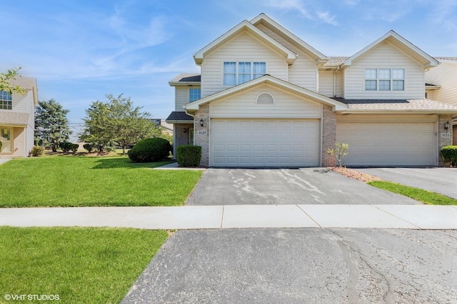3521 Park Pl, Flossmoor, IL 60422 - traditional-style house featuring driveway, brick siding, a front lawn, and an attached garage