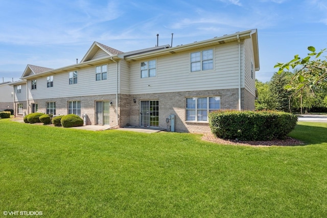 3521 Park Pl, Flossmoor, IL 60422 - rear view of property with brick siding and a yard