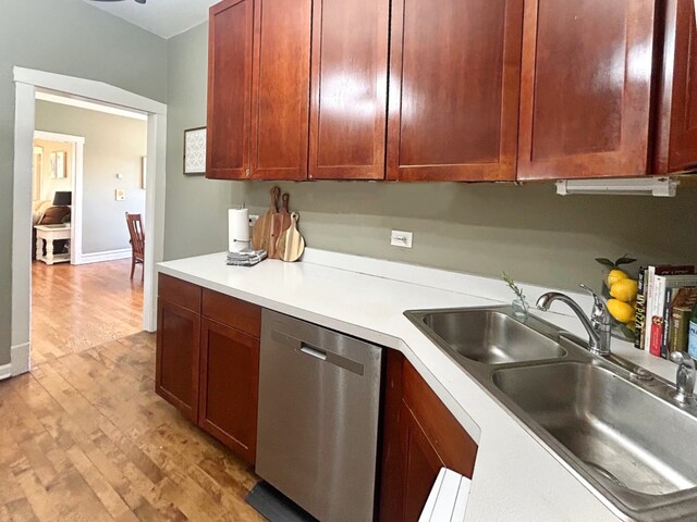 629 Garfield St Unit 1N, Oak Park, IL 60304 - kitchen featuring stainless steel dishwasher, light wood-style flooring, and light countertops