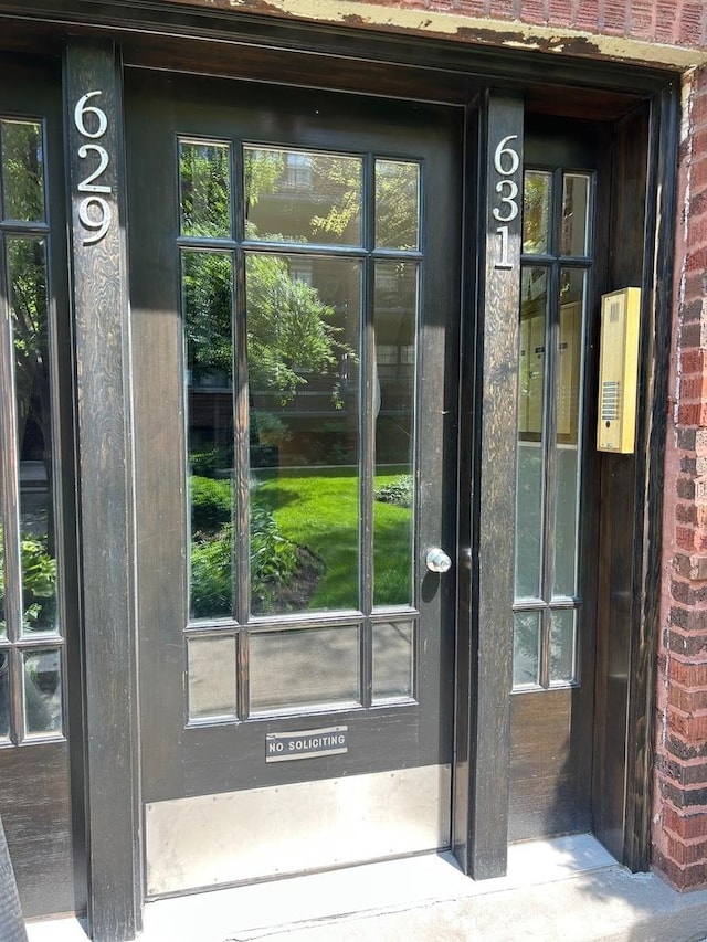 629 Garfield St Unit 1N, Oak Park, IL 60304 - doorway to property featuring brick siding
