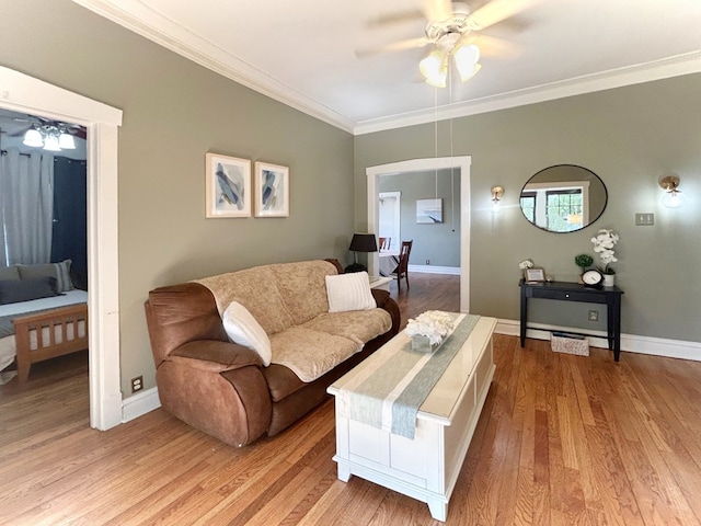629 Garfield St Unit 1N, Oak Park, IL 60304 - living room featuring a ceiling fan, crown molding, and wood finished floors