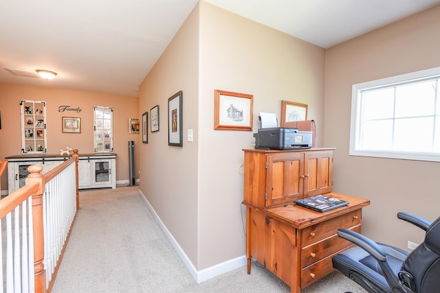 236 Marquette Pl S, Manteno, IL 60950 - hallway featuring light carpet and an office area