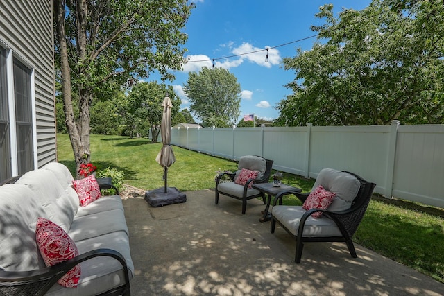 236 Marquette Pl S, Manteno, IL 60950 - fenced backyard with a patio area and an outdoor hangout area