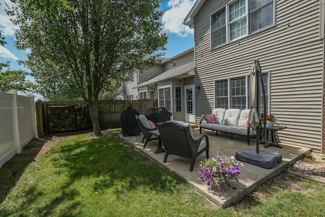 236 Marquette Pl S, Manteno, IL 60950 - fenced backyard featuring an outdoor hangout area and a patio