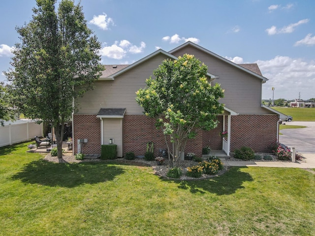 236 Marquette Pl S, Manteno, IL 60950 - view of front of property with brick siding and a patio area