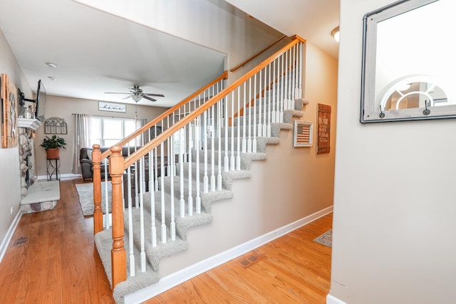 236 Marquette Pl S, Manteno, IL 60950 - stairs with wood finished floors and ceiling fan