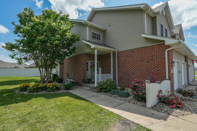 236 Marquette Pl S, Manteno, IL 60950 - view of property exterior with brick siding and a garage