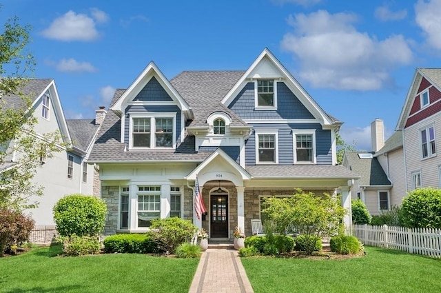 924 Linden Ave, Wilmette, IL 60091 - view of front of house featuring stone siding and roof with shingles
