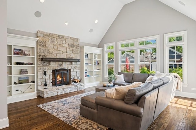 924 Linden Ave, Wilmette, IL 60091 - living room with high vaulted ceiling, healthy amount of natural light, a fireplace, and wood finished floors