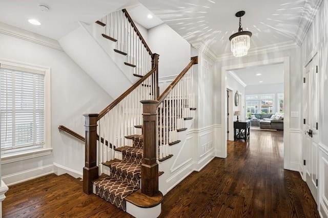 924 Linden Ave, Wilmette, IL 60091 - stairs featuring wood finished floors, crown molding, a chandelier, and recessed lighting