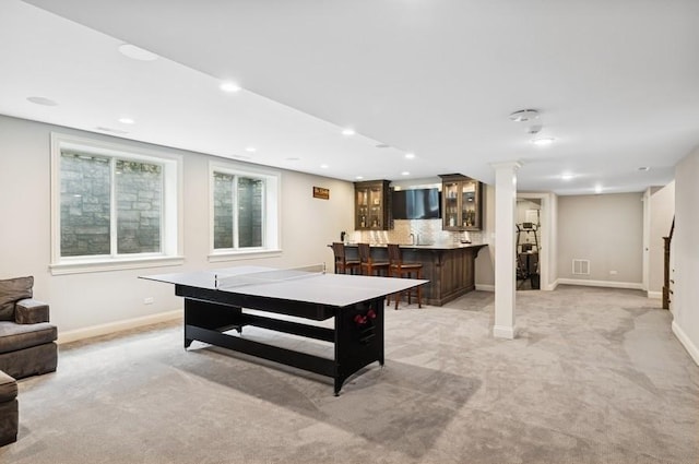 924 Linden Ave, Wilmette, IL 60091 - recreation room with wet bar, light colored carpet, and recessed lighting