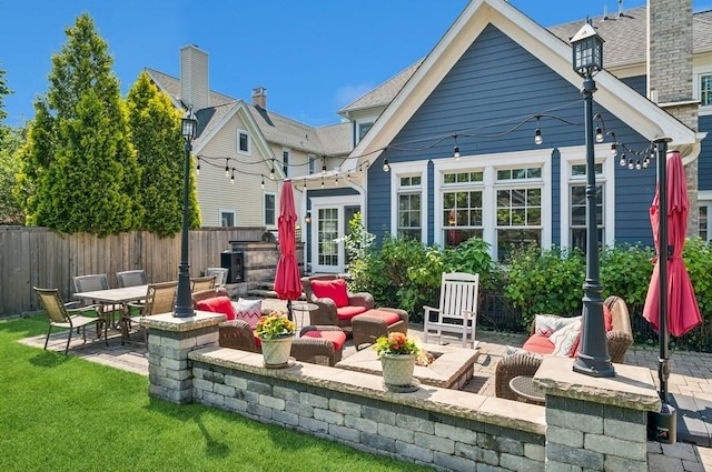 924 Linden Ave, Wilmette, IL 60091 - rear view of property featuring a patio and outdoor lounge area