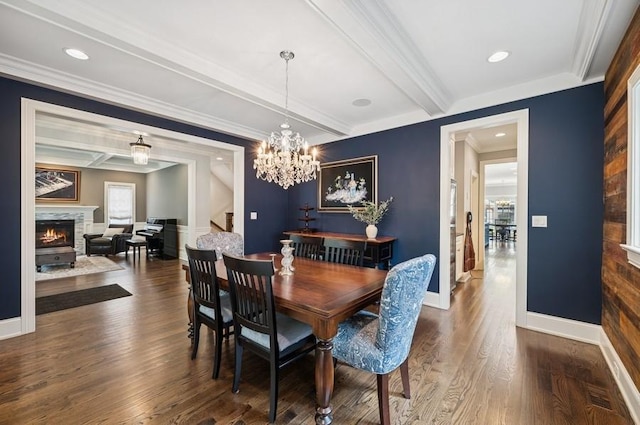 924 Linden Ave, Wilmette, IL 60091 - dining space with stairs, wood finished floors, a warm lit fireplace, beam ceiling, and a chandelier