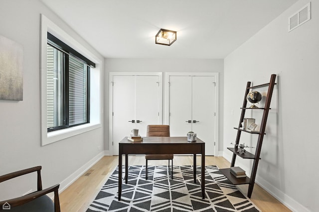 1437 W Grand Ave Unit 1S, Chicago, IL 60642 - office area featuring light wood-style flooring and baseboards