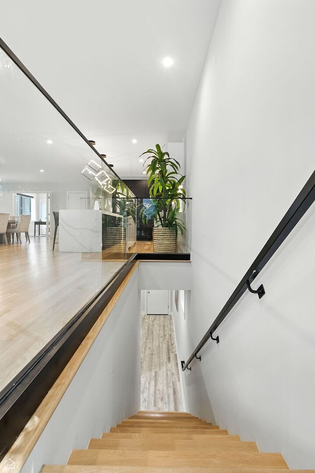 1437 W Grand Ave Unit 1S, Chicago, IL 60642 - stairway with recessed lighting and wood finished floors
