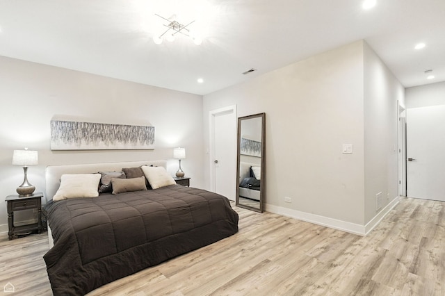 1437 W Grand Ave Unit 1S, Chicago, IL 60642 - bedroom with light wood finished floors and recessed lighting