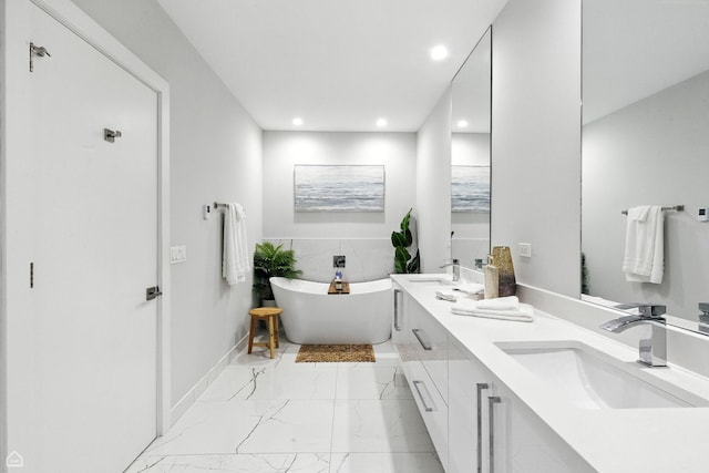 1437 W Grand Ave Unit 1S, Chicago, IL 60642 - full bathroom featuring marble finish flooring, double vanity, recessed lighting, and a soaking tub