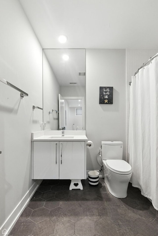 1437 W Grand Ave Unit 1S, Chicago, IL 60642 - bathroom with vanity, recessed lighting, and curtained shower