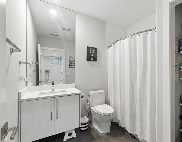 1437 W Grand Ave Unit 1S, Chicago, IL 60642 - full bath with vanity, tile patterned floors, recessed lighting, and curtained shower