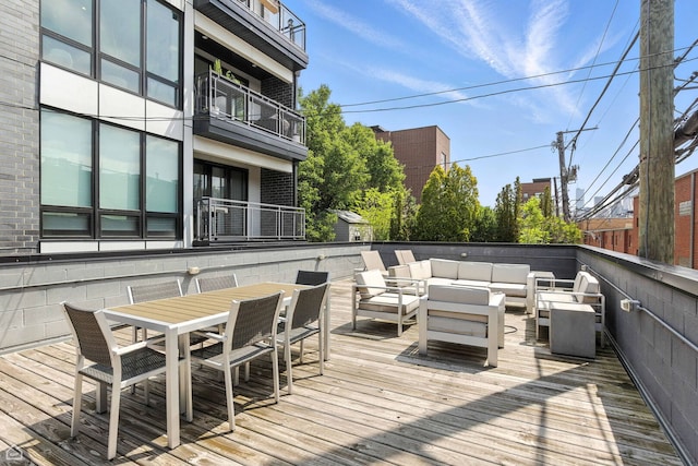 1437 W Grand Ave Unit 1S, Chicago, IL 60642 - wooden deck with outdoor lounge area and outdoor dining space