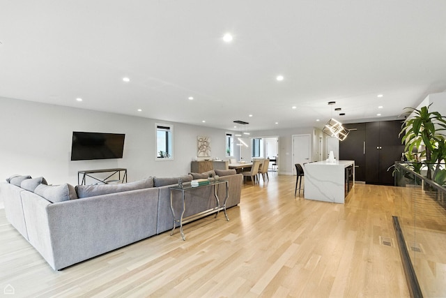 1437 W Grand Ave Unit 1S, Chicago, IL 60642 - living room featuring recessed lighting and light wood finished floors
