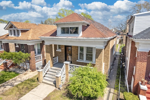 7647 S Calumet Ave, Chicago, IL 60619 - view of front of house with covered porch and brick siding