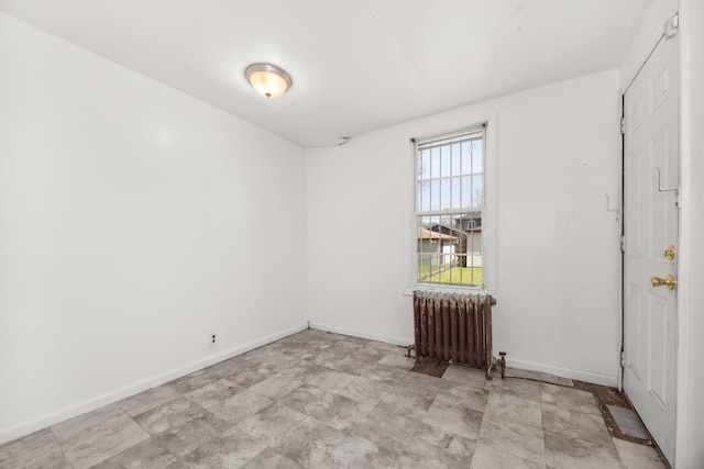 7647 S Calumet Ave, Chicago, IL 60619 - unfurnished room featuring radiator and baseboards