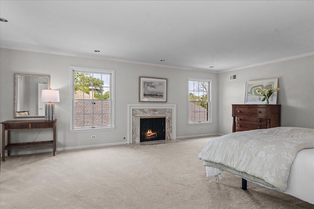 67 Brandon Rd, Northfield, IL 60093 - carpeted bedroom featuring crown molding, multiple windows, and a fireplace