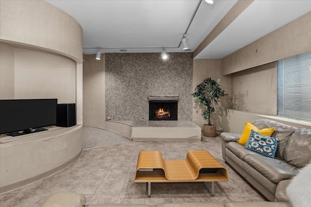 67 Brandon Rd, Northfield, IL 60093 - tiled living room with track lighting and a fireplace