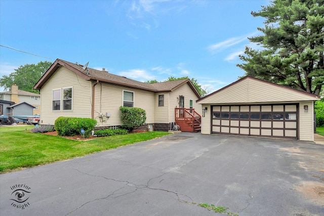 3830 W 154th Pl, Markham, IL 60428 - view of front facade featuring a garage, a front lawn, and an outdoor structure