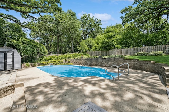 4816 Hickory Way, Johnsburg, IL 60051 - view of swimming pool with a patio area, a fenced backyard, and a storage shed