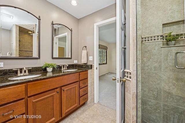 4816 Hickory Way, Johnsburg, IL 60051 - bathroom featuring a shower stall, double vanity, tile patterned floors, and recessed lighting