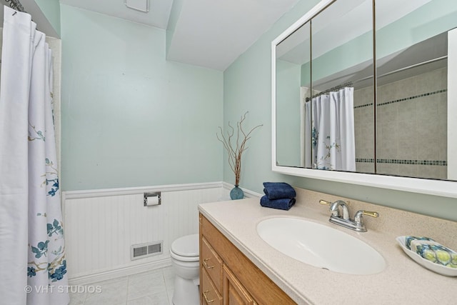 4816 Hickory Way, Johnsburg, IL 60051 - full bathroom featuring vanity, a wainscoted wall, curtained shower, and tile patterned flooring