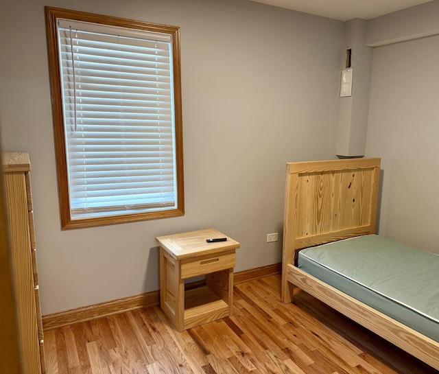 14401 Pulaski Rd, Midlothian, IL 60445 - bedroom with light wood-style floors and multiple windows