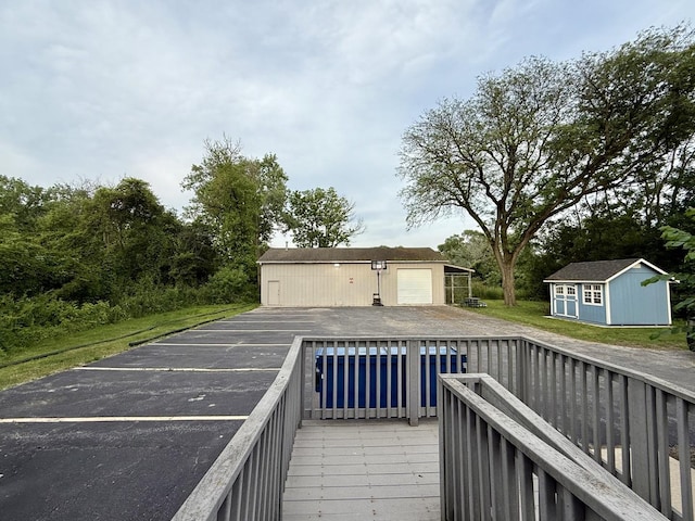 14401 Pulaski Rd, Midlothian, IL 60445 - wooden deck with an outdoor structure and a swimming pool