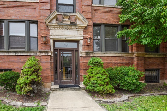 4220 S Champlain Ave Unit 2N, Chicago, IL 60653 - property entrance with brick siding