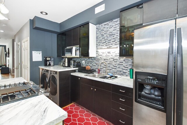 4220 S Champlain Ave Unit 2N, Chicago, IL 60653 - kitchen with stainless steel fridge with ice dispenser, washer and clothes dryer, backsplash, glass insert cabinets, and recessed lighting