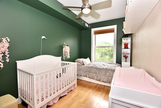 4220 S Champlain Ave Unit 2N, Chicago, IL 60653 - bedroom featuring light wood finished floors and a ceiling fan