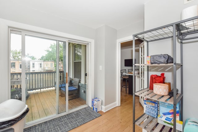4220 S Champlain Ave Unit 2N, Chicago, IL 60653 - entryway with hardwood / wood-style flooring and baseboards