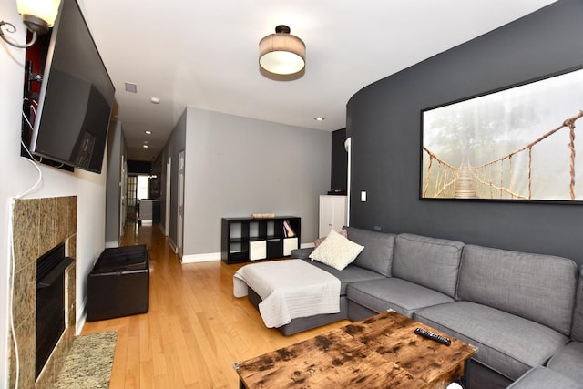 4220 S Champlain Ave Unit 2N, Chicago, IL 60653 - living room featuring light wood-style floors, a fireplace, and recessed lighting