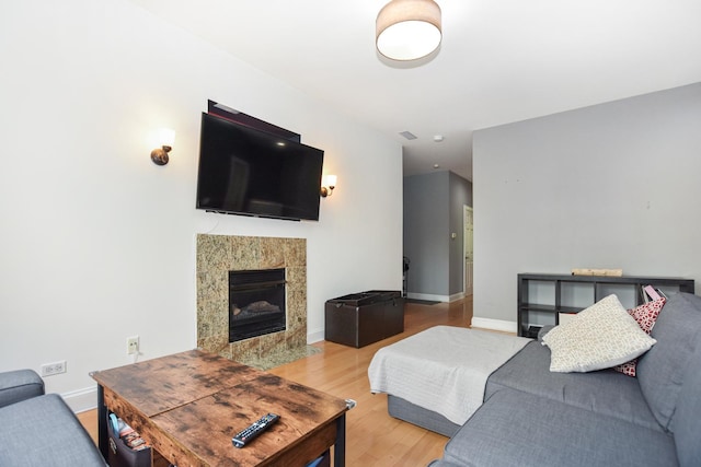 4220 S Champlain Ave Unit 2N, Chicago, IL 60653 - living room with wood finished floors and a tile fireplace