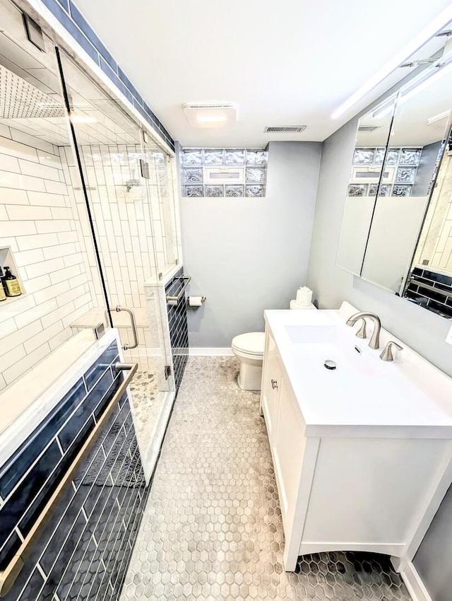 8049 Country Club Ln, North Riverside, IL 60546 - full bathroom with vanity, a stall shower, and tile patterned floors